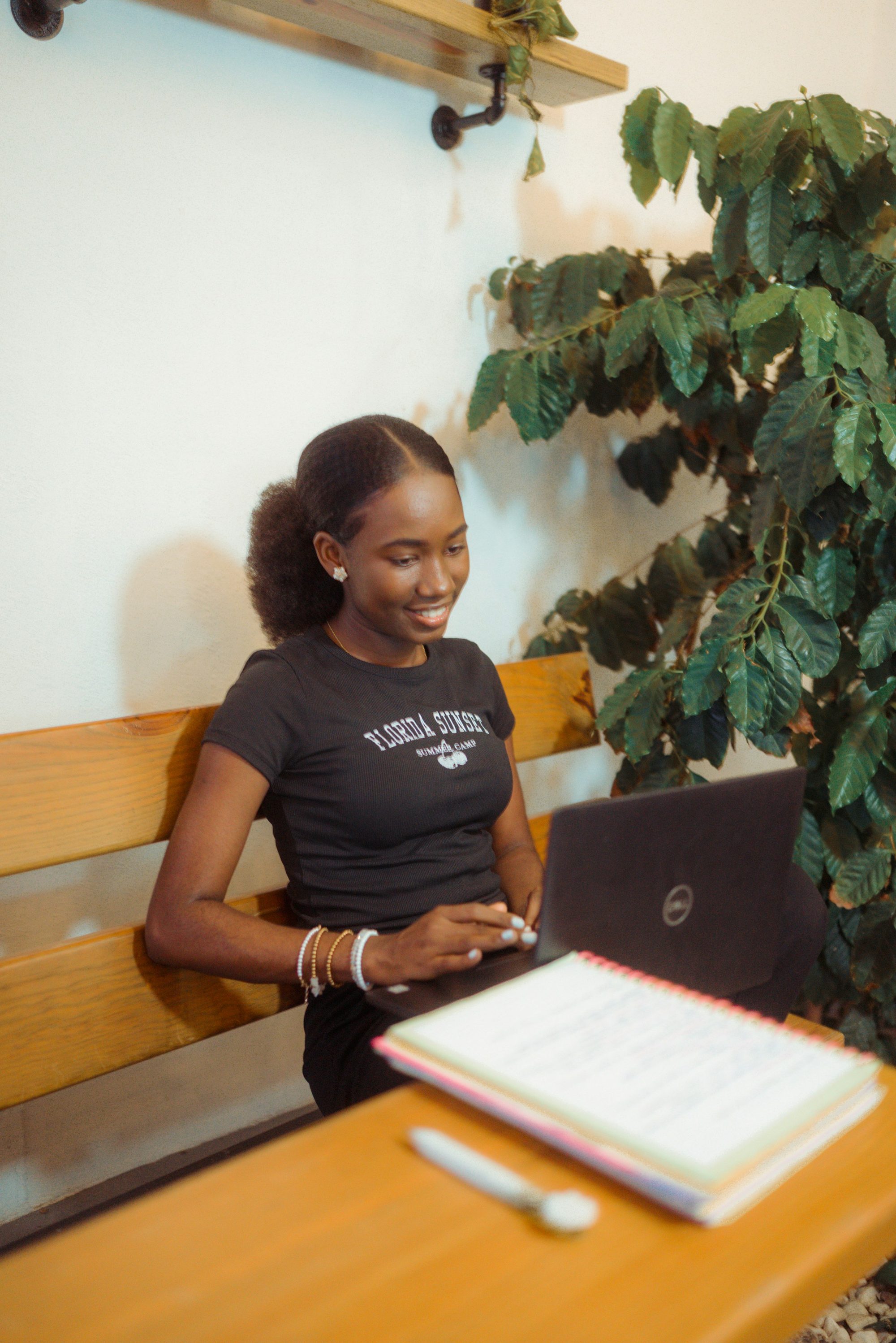 An online seller working on her laptop at home