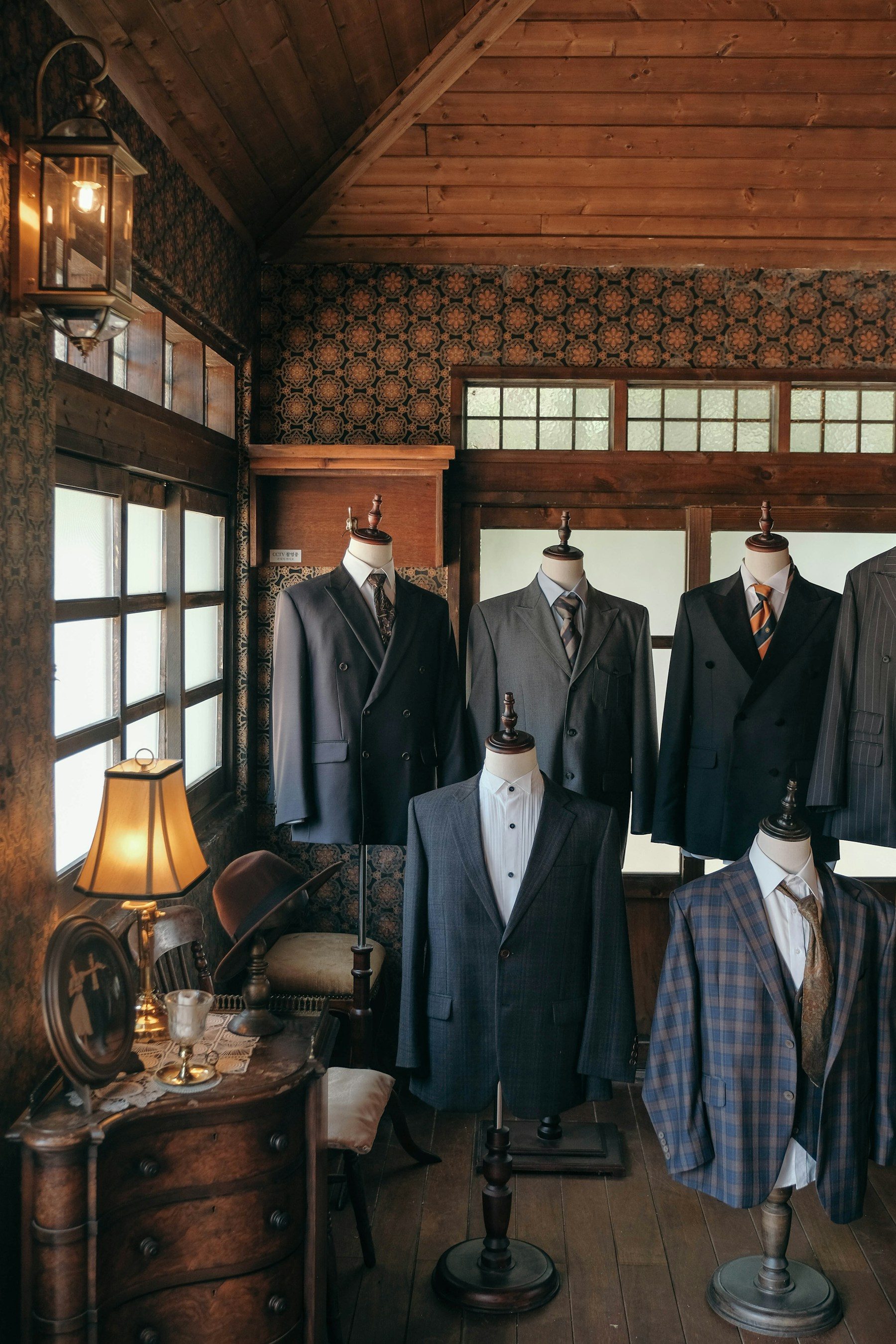 A bespoke tailoring shop with suits on display